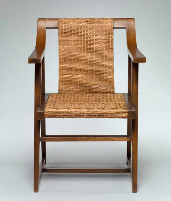 Armchair, c. 1904. Hans Vollmer (Austrian, 1879-). Oak with replacement upholstered slip seat; overall: 85.1 x 56.6 x 59.1 cm (33 1/2 x 22 5/16 x 23 1/4 in.). The Cleveland Museum of Art, Gift of Barry Friedman and Patricia Pastor, New York 1984.178