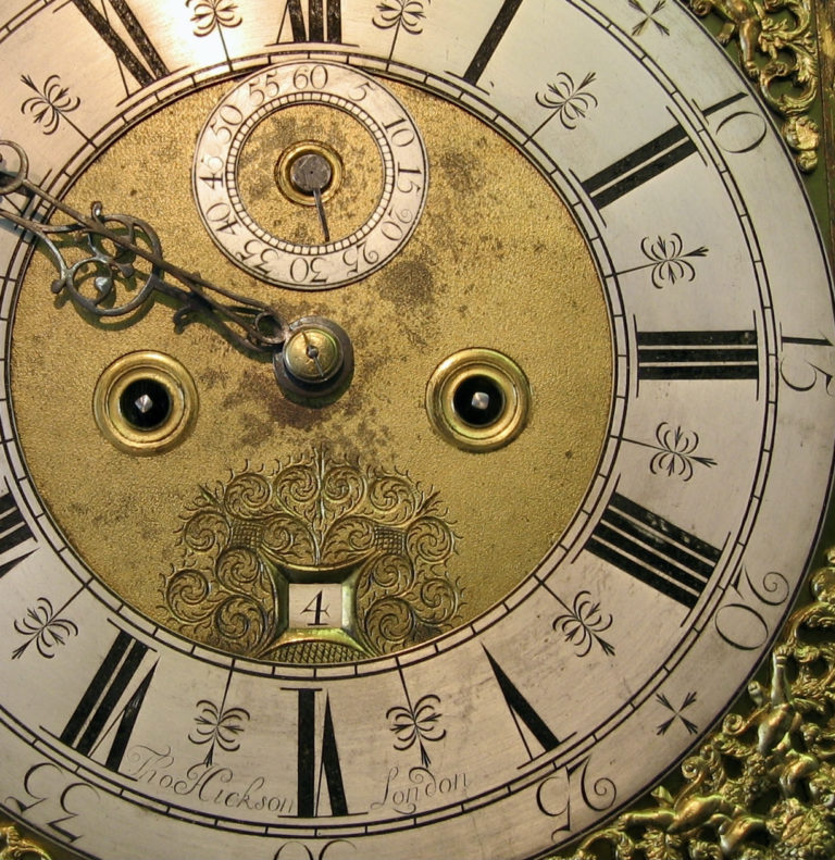 Detail of antique composite longcase clock dial