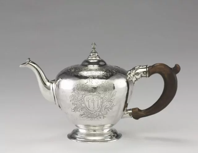 Teapot, c. 1755–60. Nathaniel Hurd (American, 1730–1778). Silver, Wood; with handle: 14.5 x 24.4 cm (5 11/16 x 9 5/8 in.). The Cleveland Museum of Art, Gift of Hollis French, 1940.228
