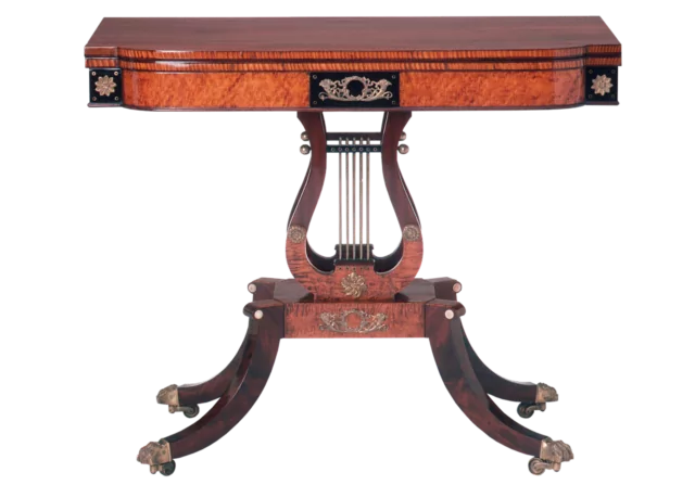 American Federal fold-over card table in curly maple, mahogany and ebony, circa 1820.