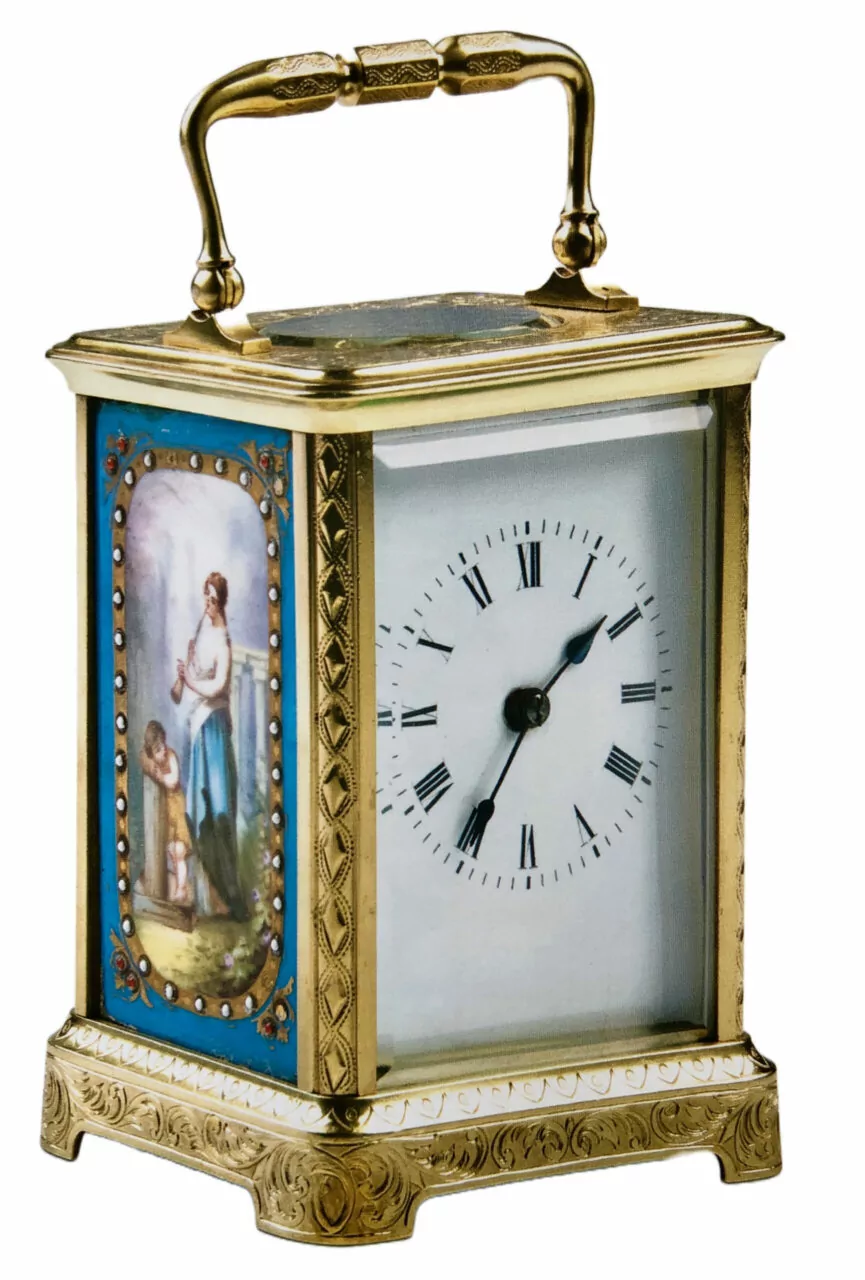 Carriage clock in engraved Corniche case with porcelain side panels, circa 1900
