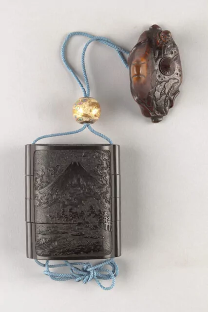 Lacquered Japanese Inrō with Design of Mount Fuji (obverse), and Dragon in Clouds and Waves (reverse).
