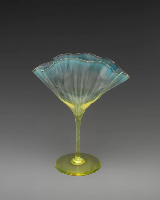 Title: Fan-shaped vaseDesigner: Attributed to Harry Powell (British, 1853–1922)Maker: James Powell and SonsManufacturer: Whitefriars Glassworks (British, 1834–1980)Date: ca. 1890Culture: British, LondonMedium: “Straw opal” glass