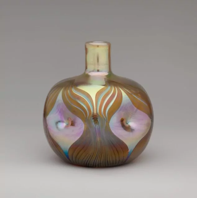 Title: VaseDesigner: Designed by Louis C. Tiffany (American, New York 1848–1933 New York)Maker: Tiffany Glass and Decorating Company (American, 1892–1902)Date: 1893–96Geography: Made in Queens, New York, New York, United StatesCulture: AmericanMedium: Favrile glassDimensions: H. 5 in. (12.7 cm)