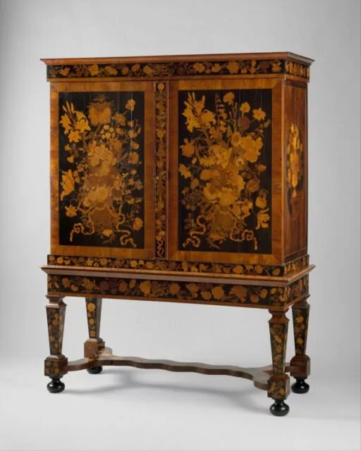 Dutch walnut veneered and rosewood, olivewood, ebony, holly, tulipwood, and barberry marquetry cabinet-on-stand, attributed to Jan van Mekeren (Amsterdam, circa 1658-1733), circa 1700-1710.